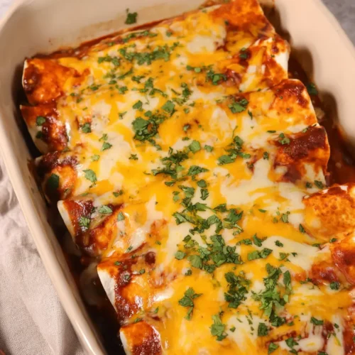 The Best Ground Beef Enchiladas Recipe Everyone Will Love 8 Cheesy ground beef enchiladas baked in sauce topped with melted cheese