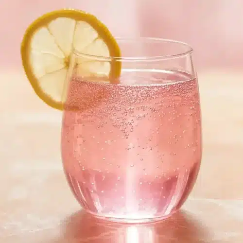 pink salt trick recipe with apple cider vinegar drink in glass